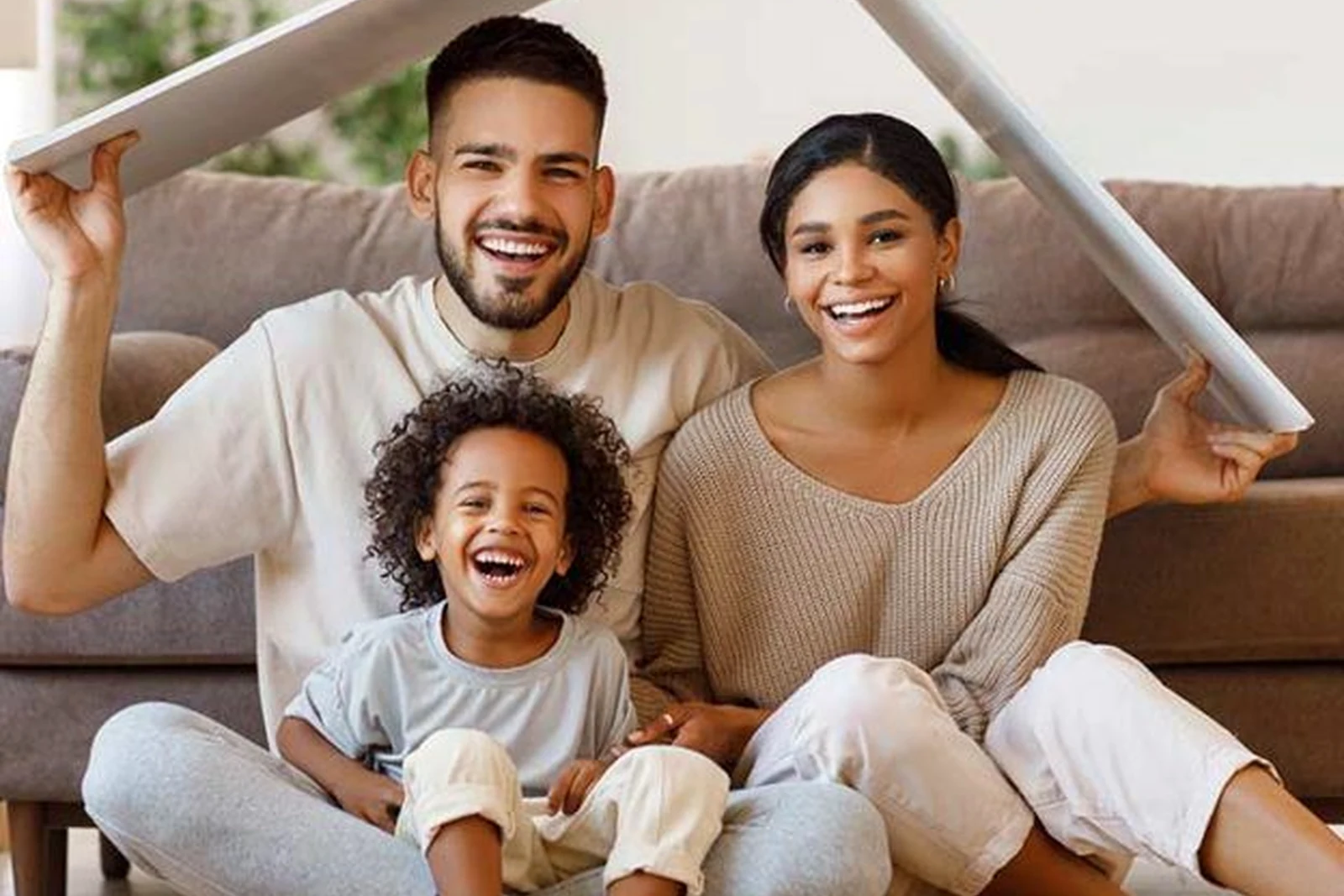 Family reviewing insurance needs at home